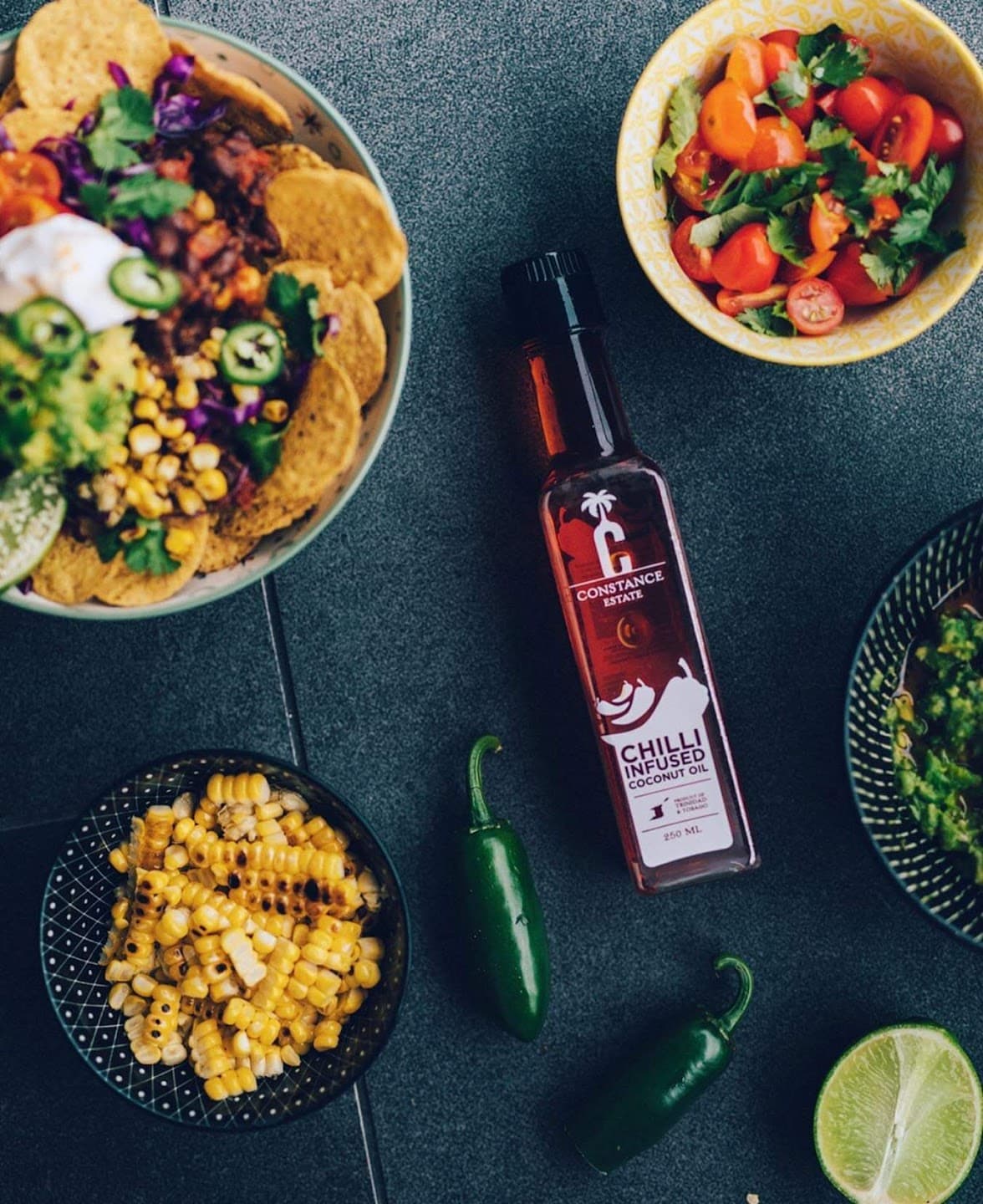 Branded condiment bottle and plated food prepared for private-label presentation.